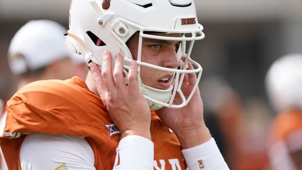 Texas Longhorns quarterback quarterback Arch Manning (16) warms up before a game against the Brigham Young Cougars at Darrell K Royal-Texas Memorial Stadium.